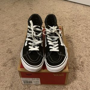 Vans Black and White High-Top Sneakers